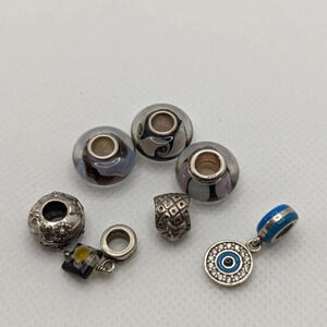 7 sterling  charms